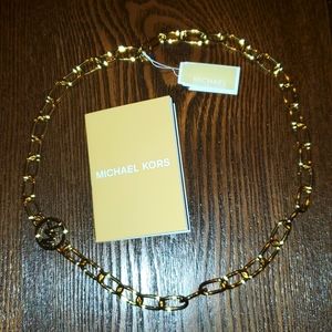 Michael Kors logo necklace.